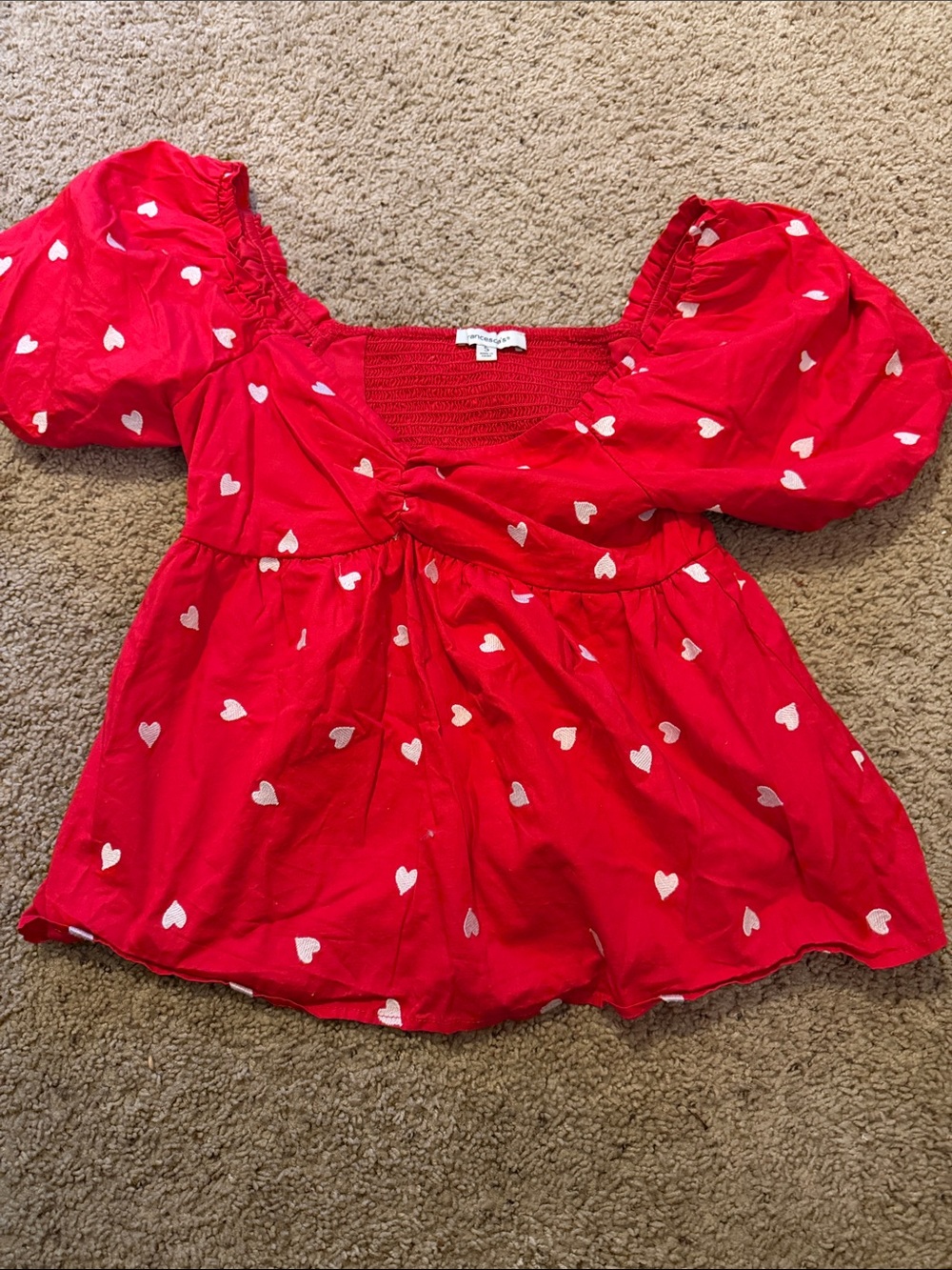 Francesca’s Red Heart Print Puff-Sleeve Shirt.